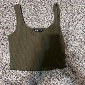 Shrink tank top. Size medium. Color is dark green.